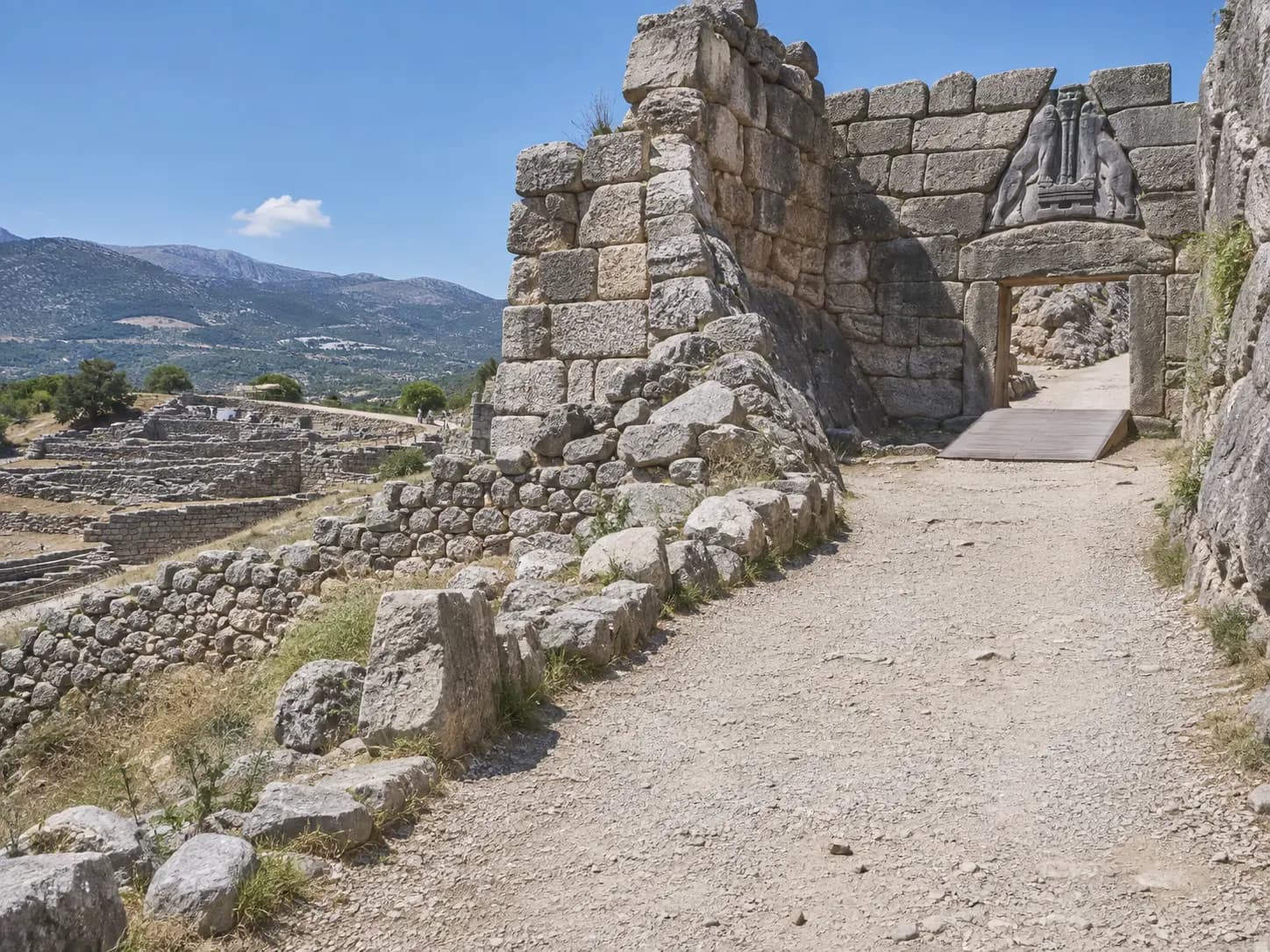 The Lion Gate at Mycenae with its carved lionesses above the Cyclopean stone walls of the citadel
