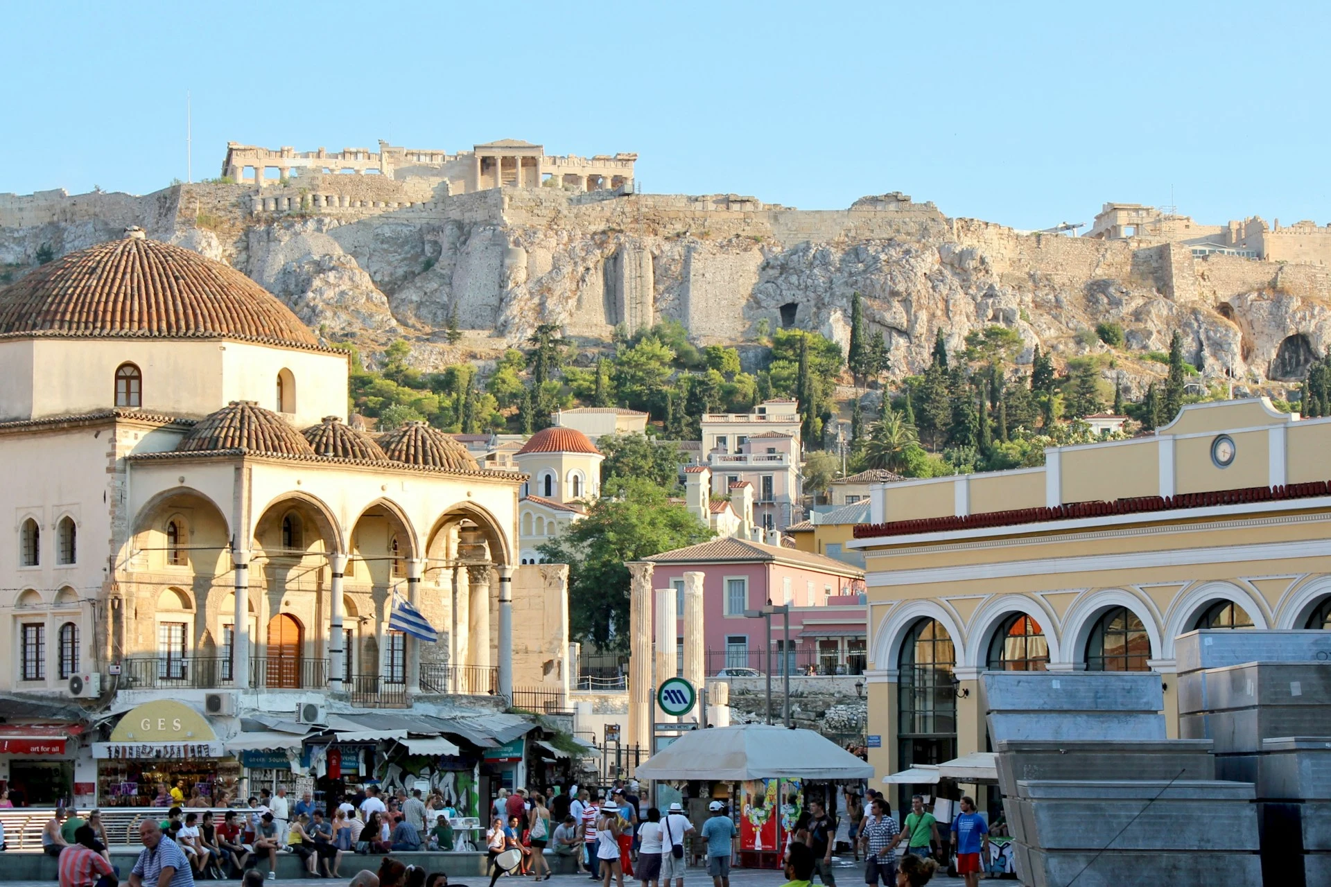 Rooftops of central Athens with the Acropolis rising on its rock behind the city