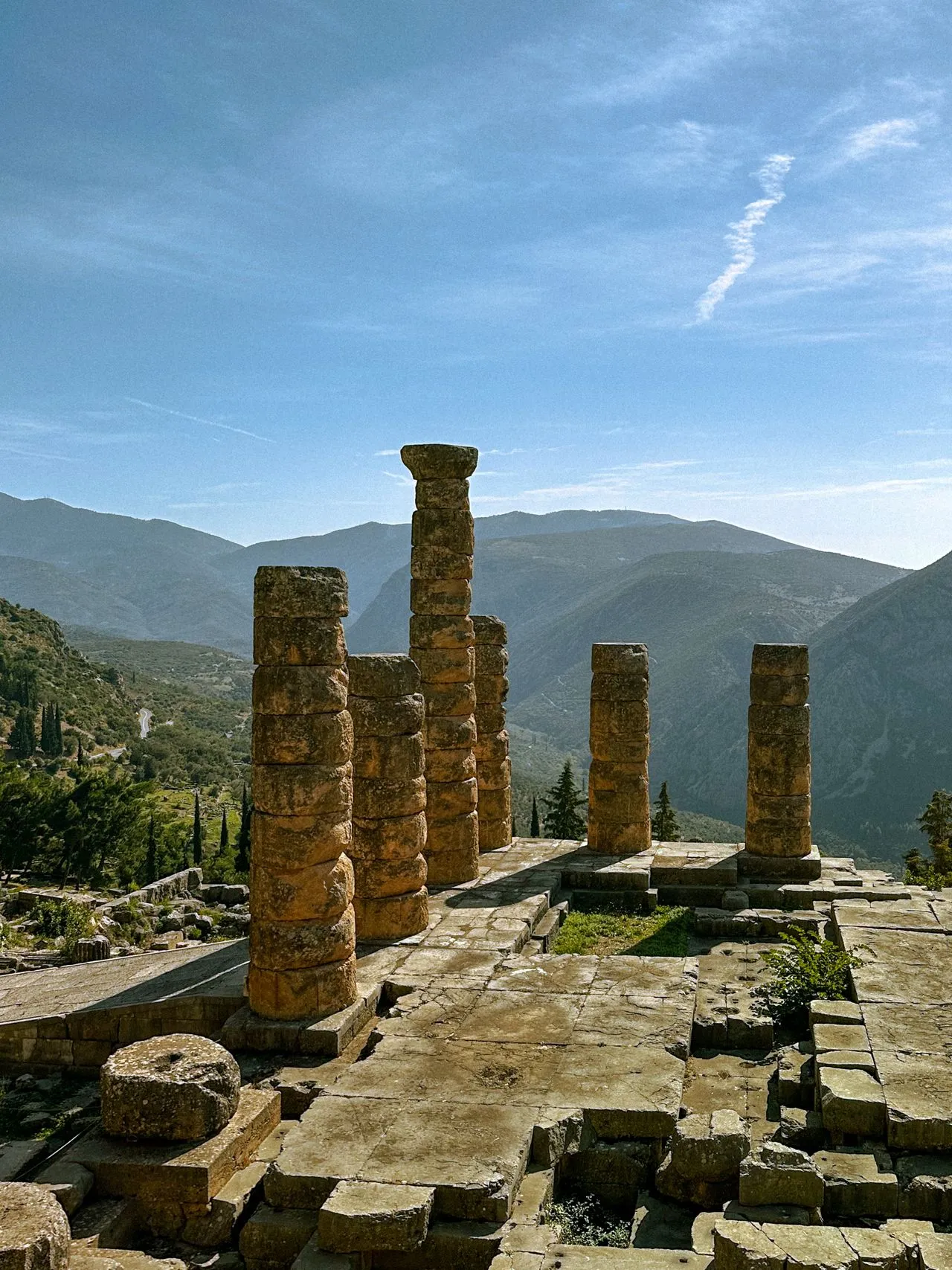 Standing columns of the Temple of Apollo at Delphi with the mountains of Parnassus behind